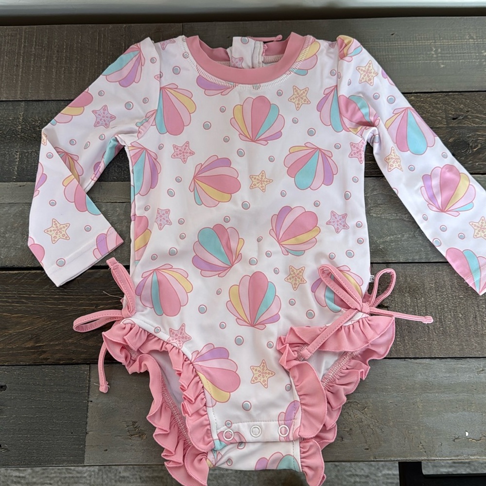 CADEN LANE LONG SLEEVE RASH GUARD WITH RUFFLE BOTTOM | BEST SELLERS